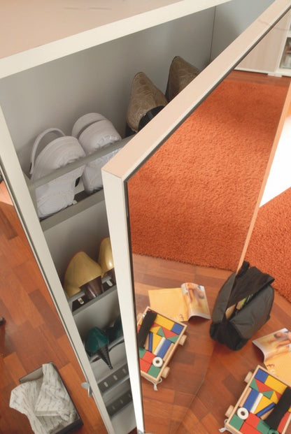 Space-saving shoe cabinet with white finish